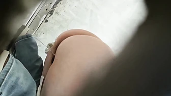 College Student Peeping Through a Hole