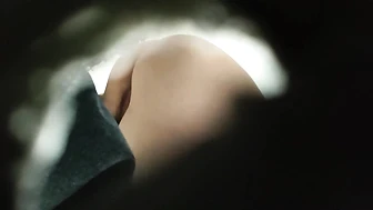 College Student Peeping Through a Hole